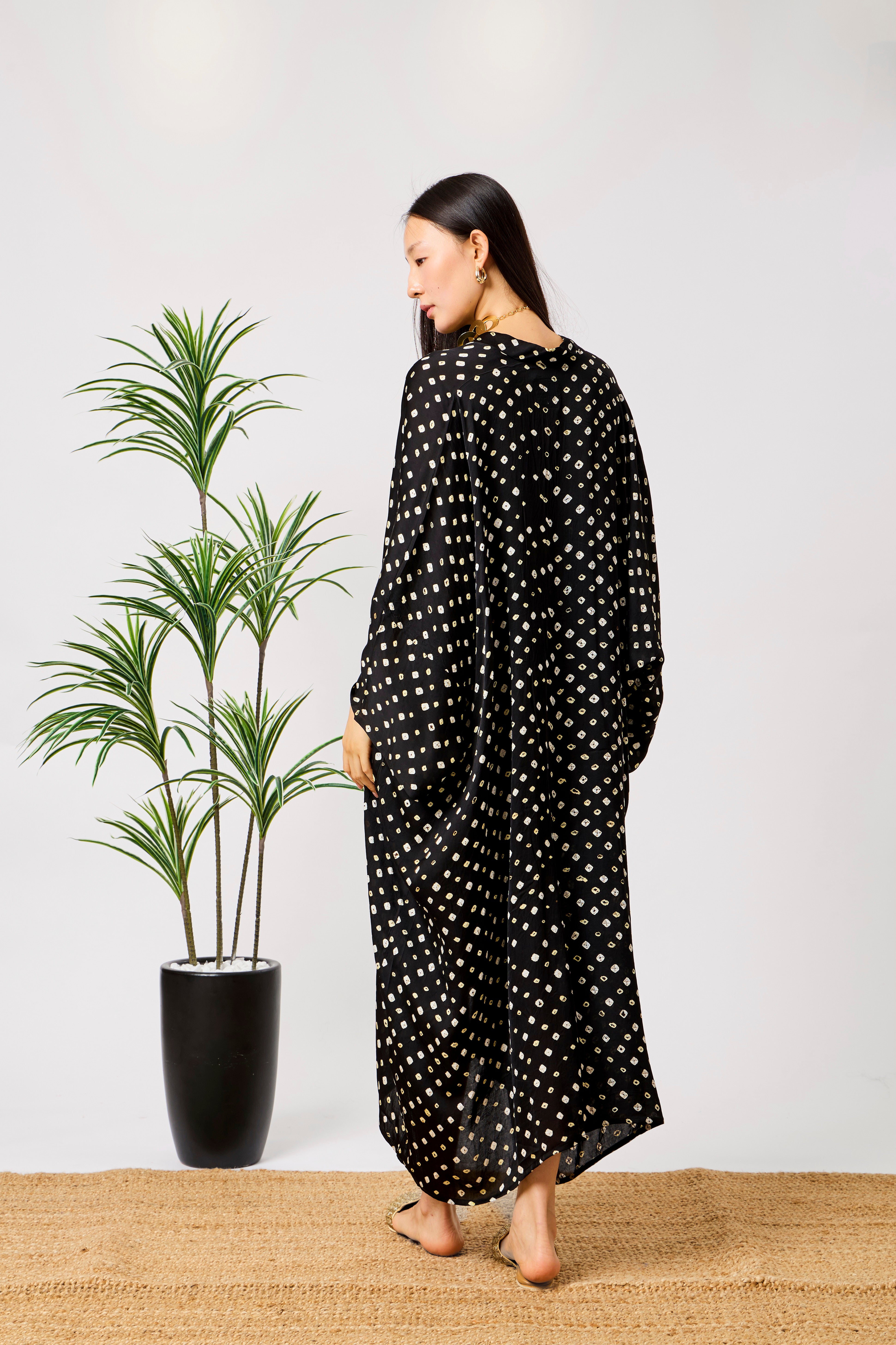 Black Modal Silk Bandhani Print Kaftan Dress for Women with Batwing Sleeves & Tassel Neckline | Noirelle