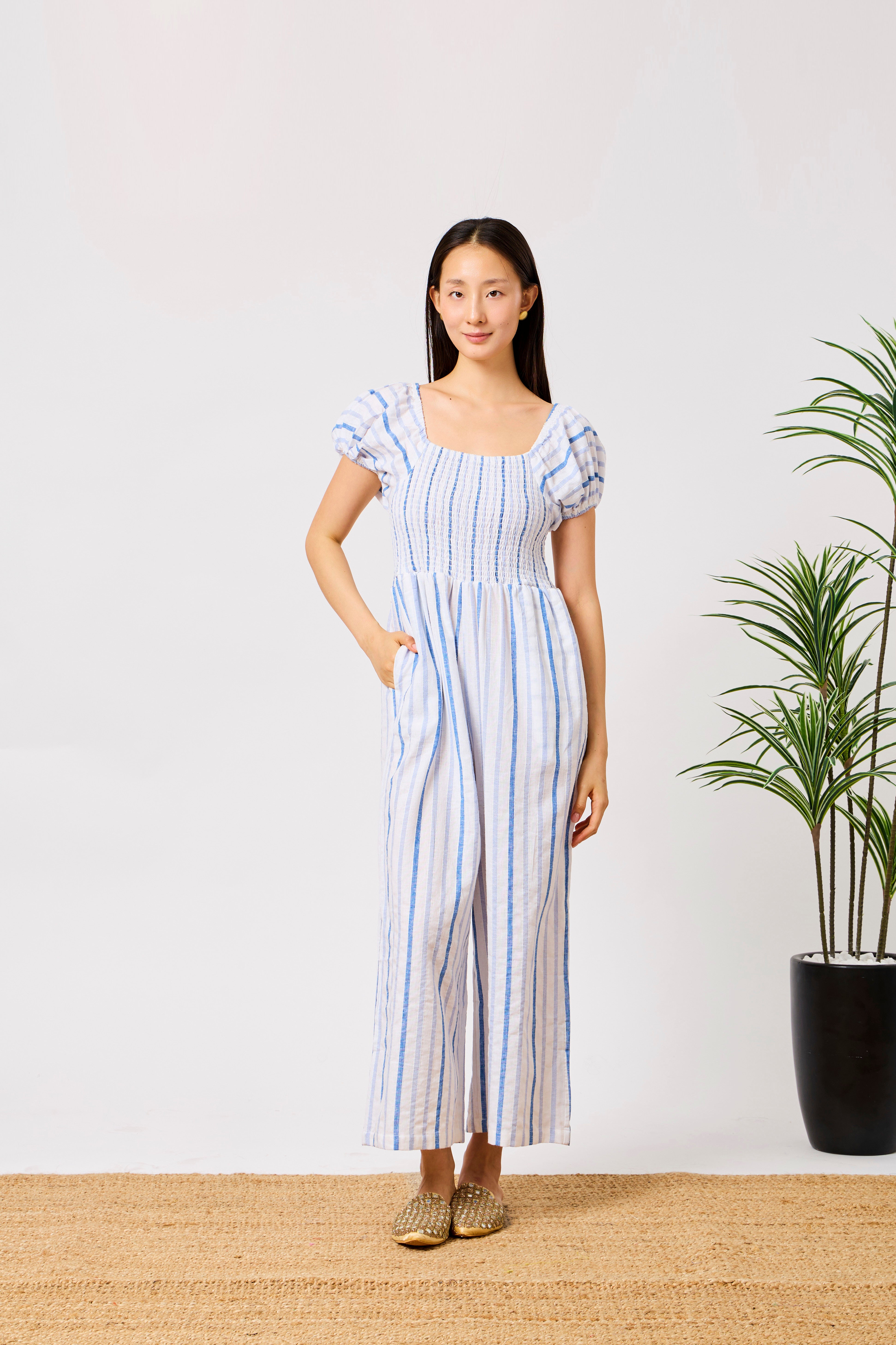 Blue Cotton Linen Blend Striped Smocked Jumpsuit for Women with Puff Sleeves & Wide-Leg Fit | Noory