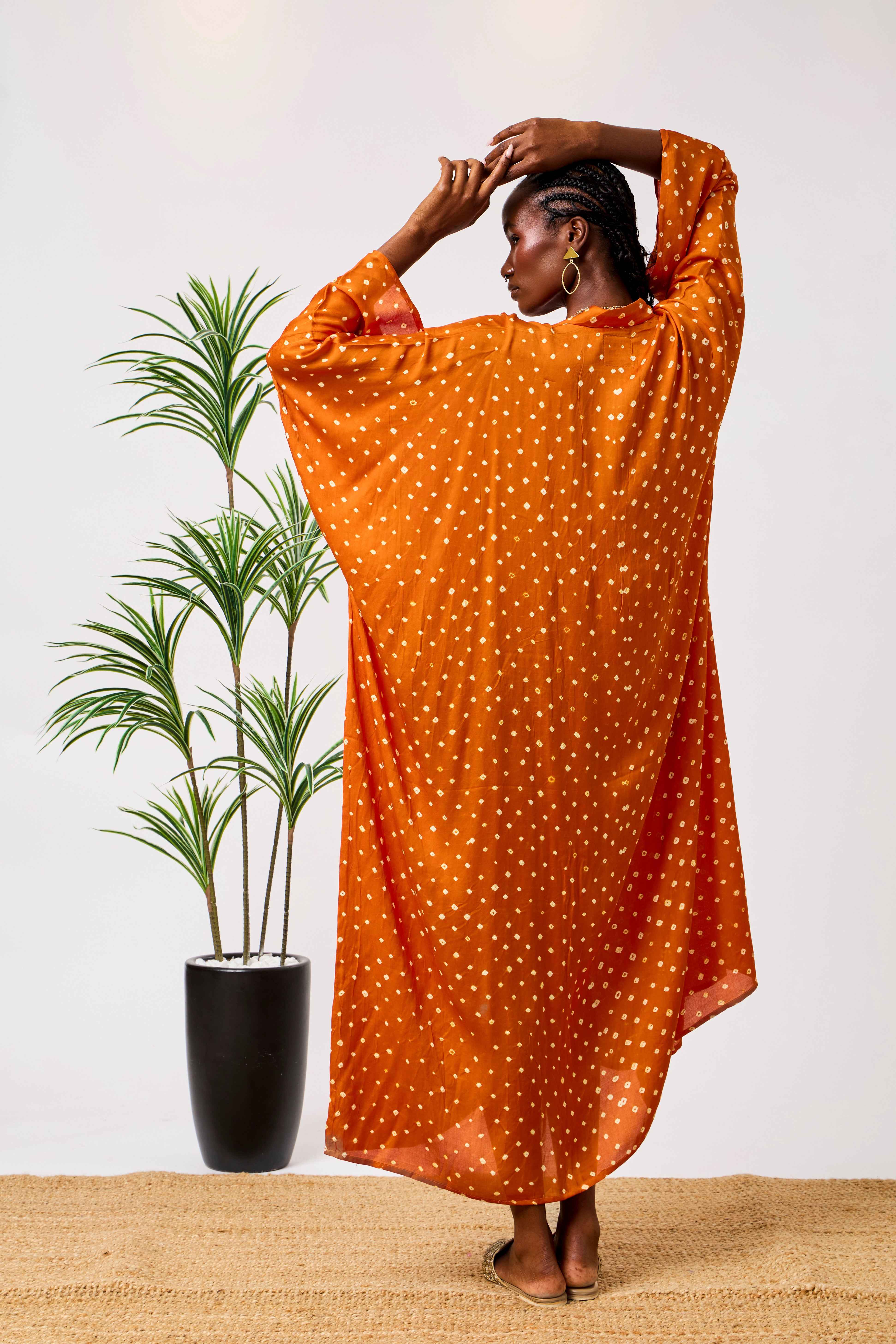 Orange Modal Silk Bandhani Print Kaftan Dress for Women with Batwing Sleeves & Tassel Neckline | Solene