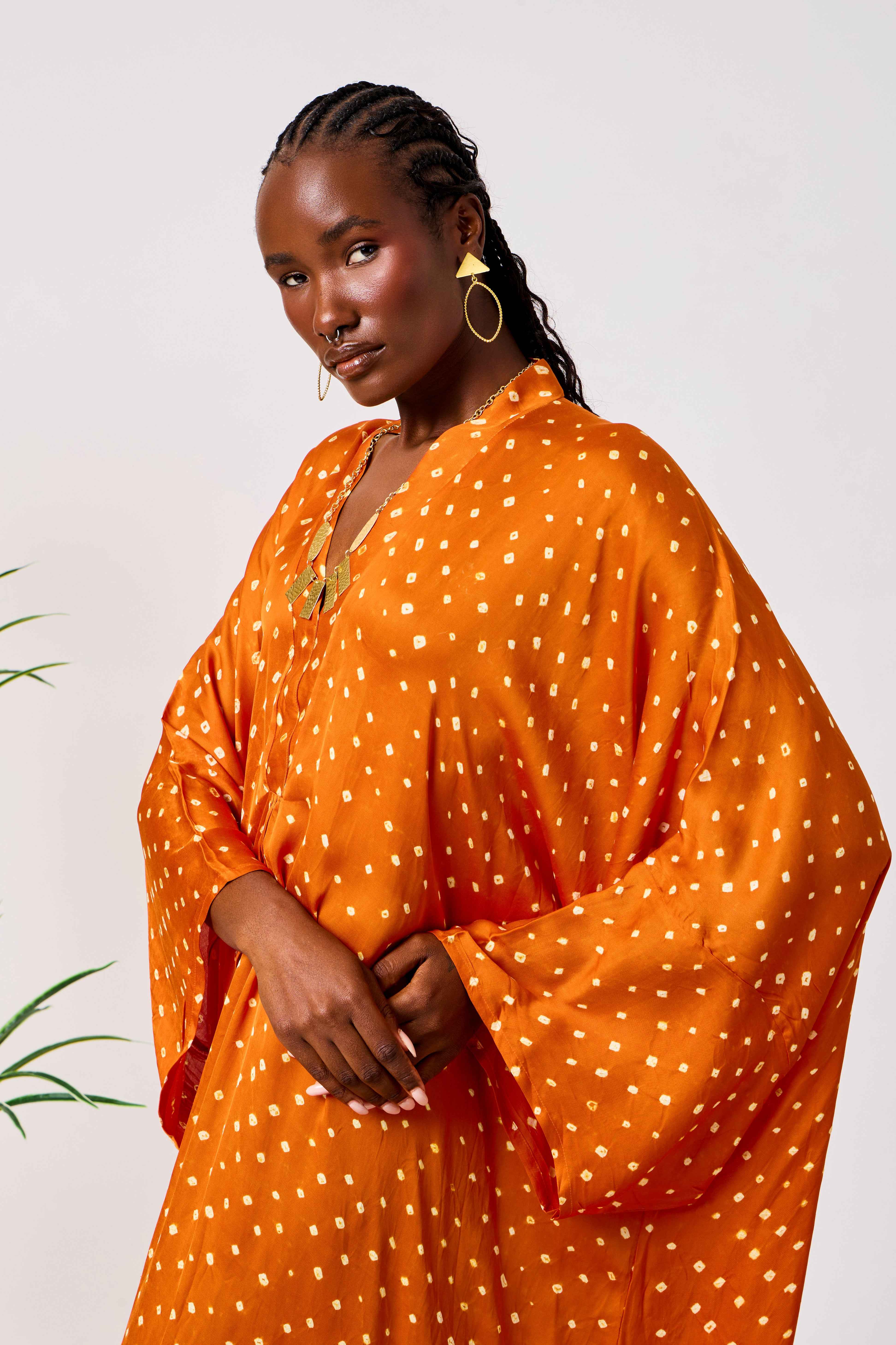 Orange Modal Silk Bandhani Print Kaftan Dress for Women with Batwing Sleeves & Tassel Neckline | Solene