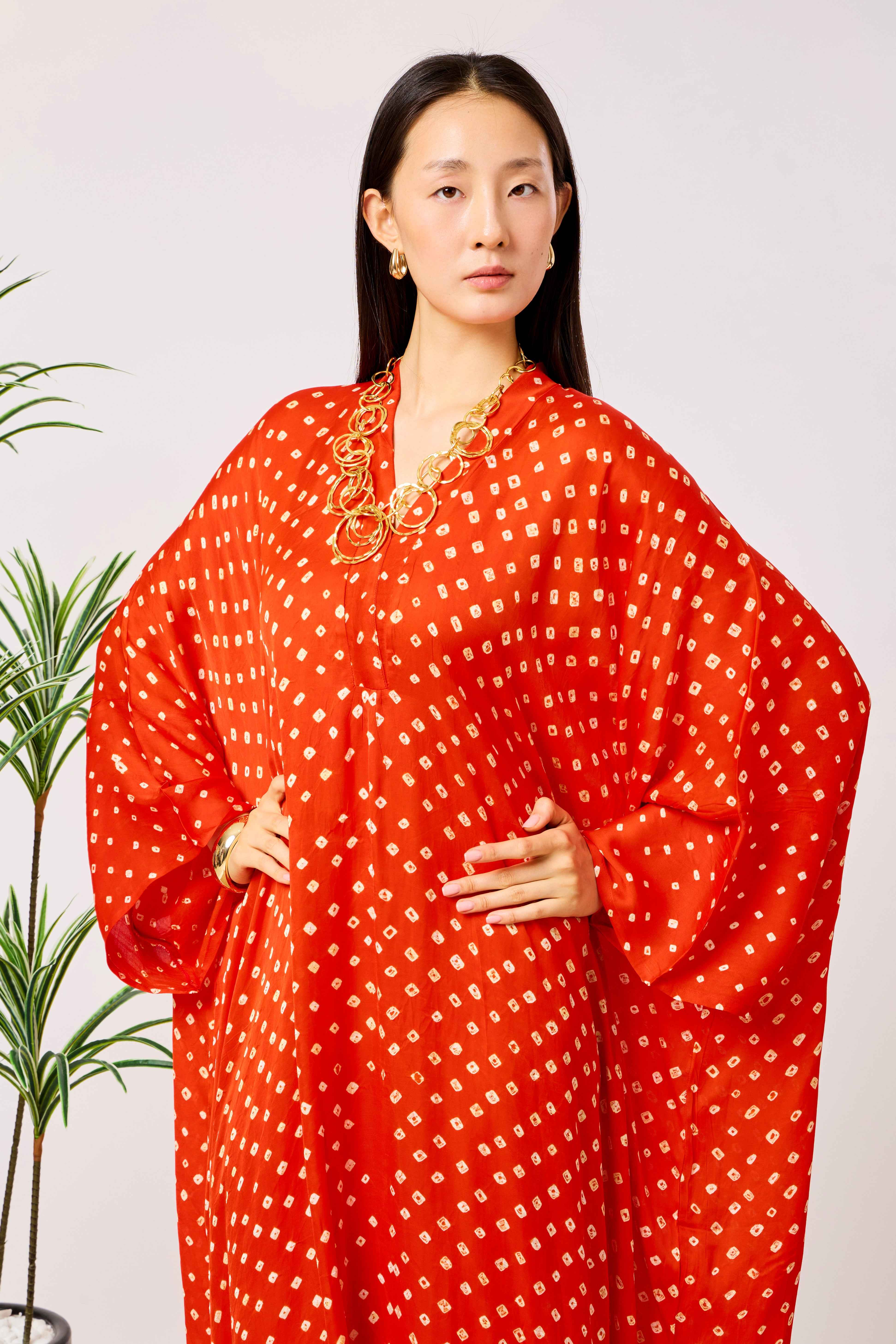 Orange Modal Silk Bandhani Print Kaftan Dress for Women with Batwing Sleeves & Tassel Neckline | Seraphine
