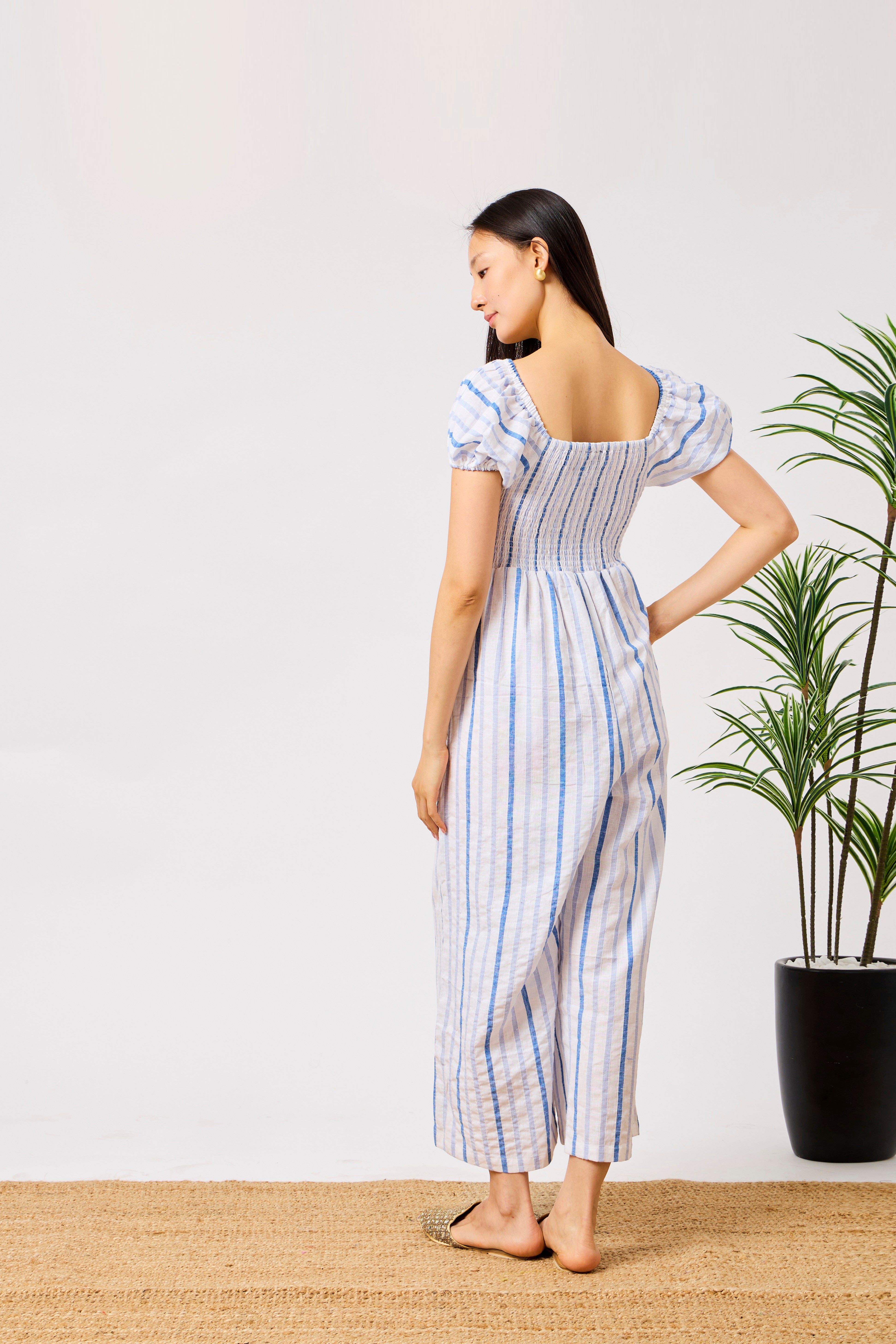 Blue Cotton Linen Blend Striped Smocked Jumpsuit for Women with Puff Sleeves & Wide-Leg Fit | Noory